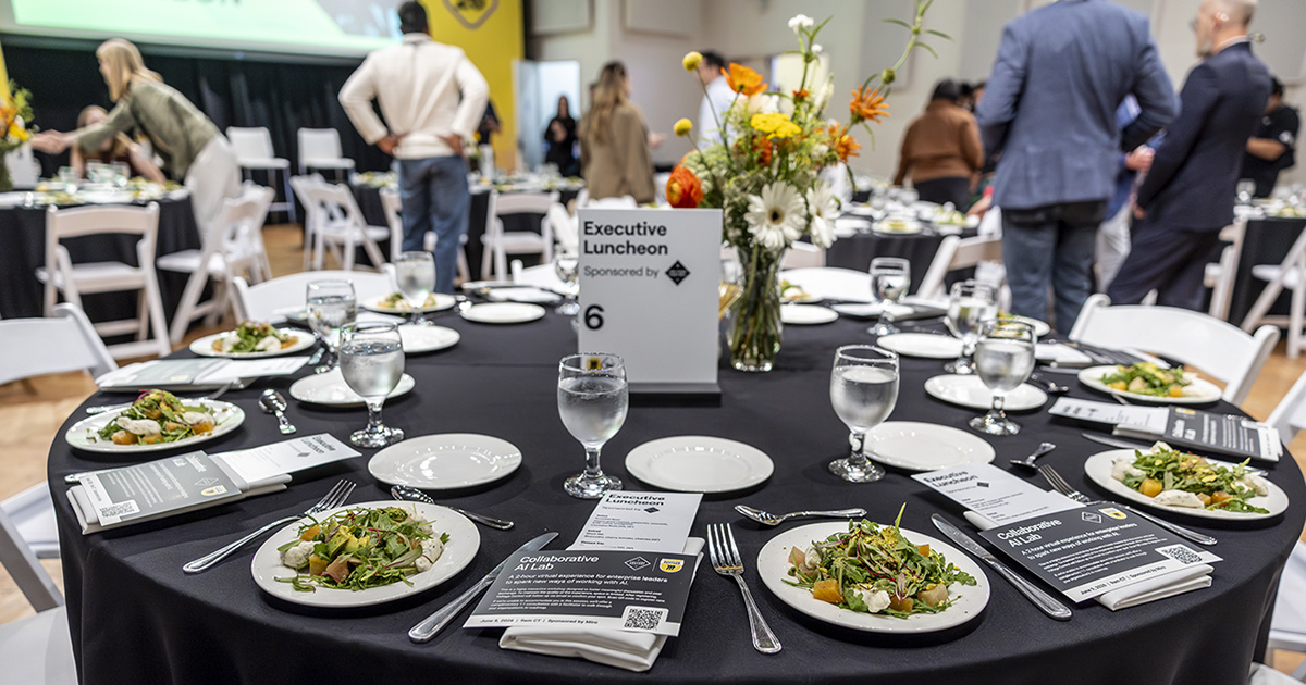 Seated dining at Miro Canvas 26, part of a conference program that brought together presentations, networking and hospitality.